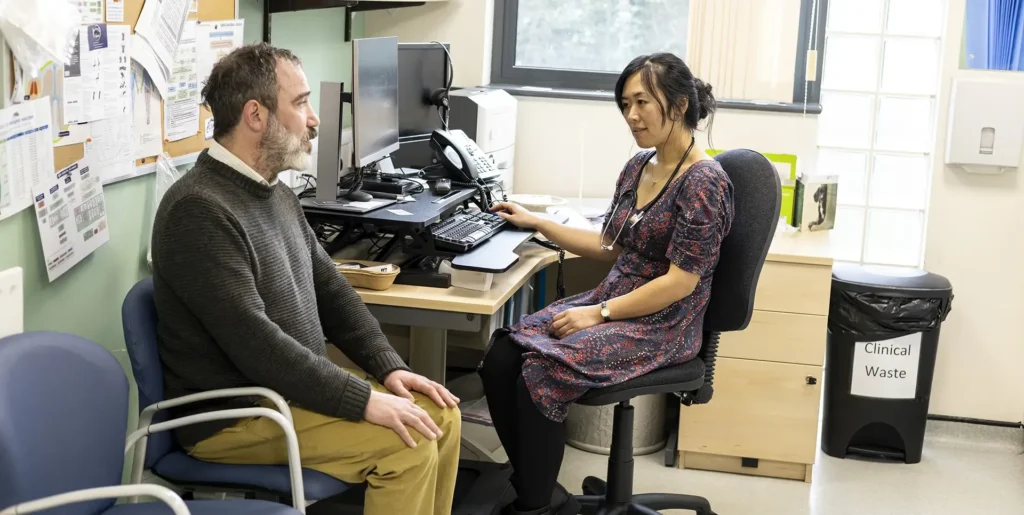 Consultation between doctor and patient.